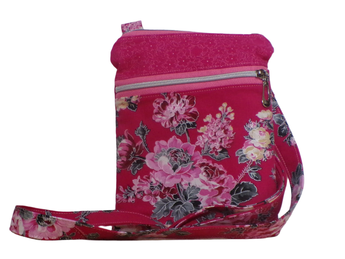 Grey and pink floral handmade quilted crossbody bag, front view, Emerald Stitch Quilting