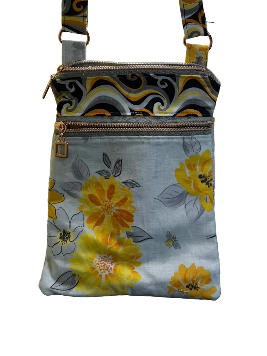 Floral-patterned bag with a strap