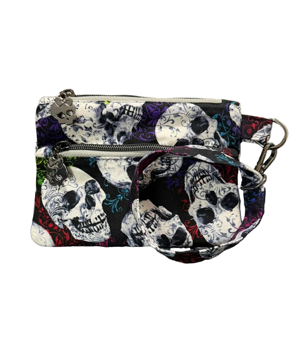 A small zip pouch with a black, white, and red skull pattern and colorful accents, 