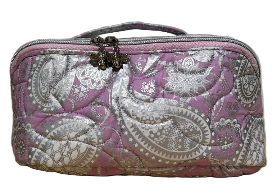 Front of the Haven Pouch in Frosted Orchid, a handmade quilted pouch with pink and lavender silver paisley fabric and top handle
