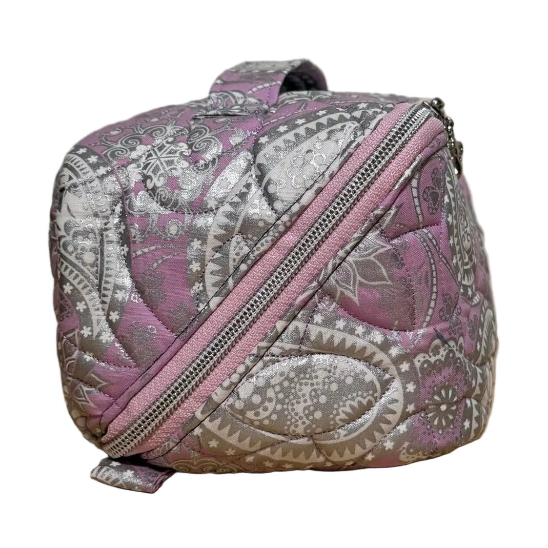 Side view of the handmade quilted Haven Pouch in Frosted Orchid with silver paisley print and wrap-around zipper