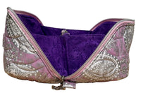 Haven Pouch in Frosted Orchid with the wrap-around zipper opened wide to show the purple vine-print interior