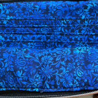 Kitten Cuddle Vibe XL Bag with the front pocket open to show the blue floral lining and card slots