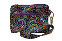 Carnival Swirl Swing Bag Mini wristlet with two front zip pockets and a wrist strap in bright paisley fabric