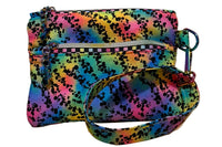 Rainbow Riot Swing Mini wristlet with double zip compartments and a wrist strap in colorful splatter fabric